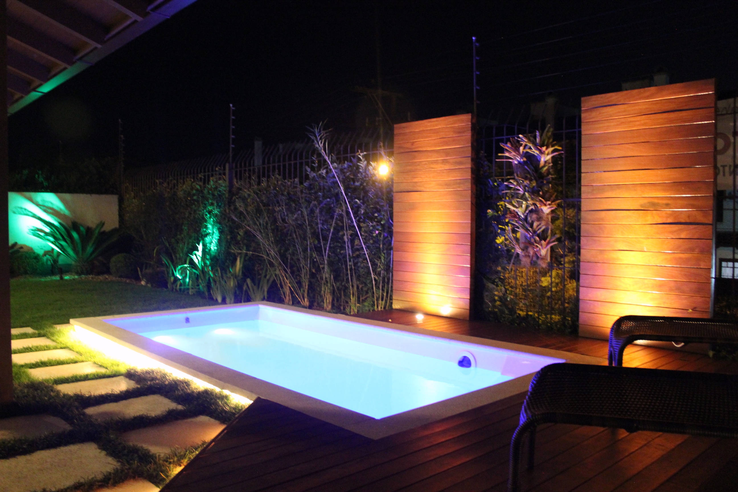 Foto de piscina de noite